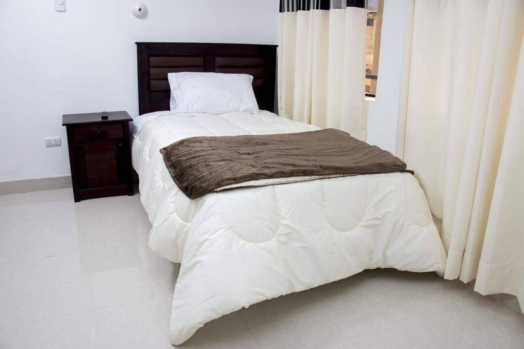 Hostal Santa Rosa Caraz Quarto foto